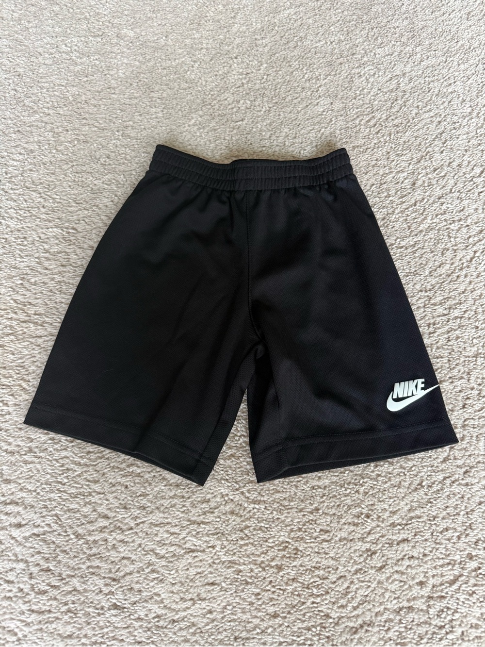Nike Kids Black Shorts with White Swoosh